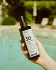 Remargin solari - latte solare spray SPF 30 resistente all'acqua con Colostro, estratti di Ylang Ylang e Pino Marittimo