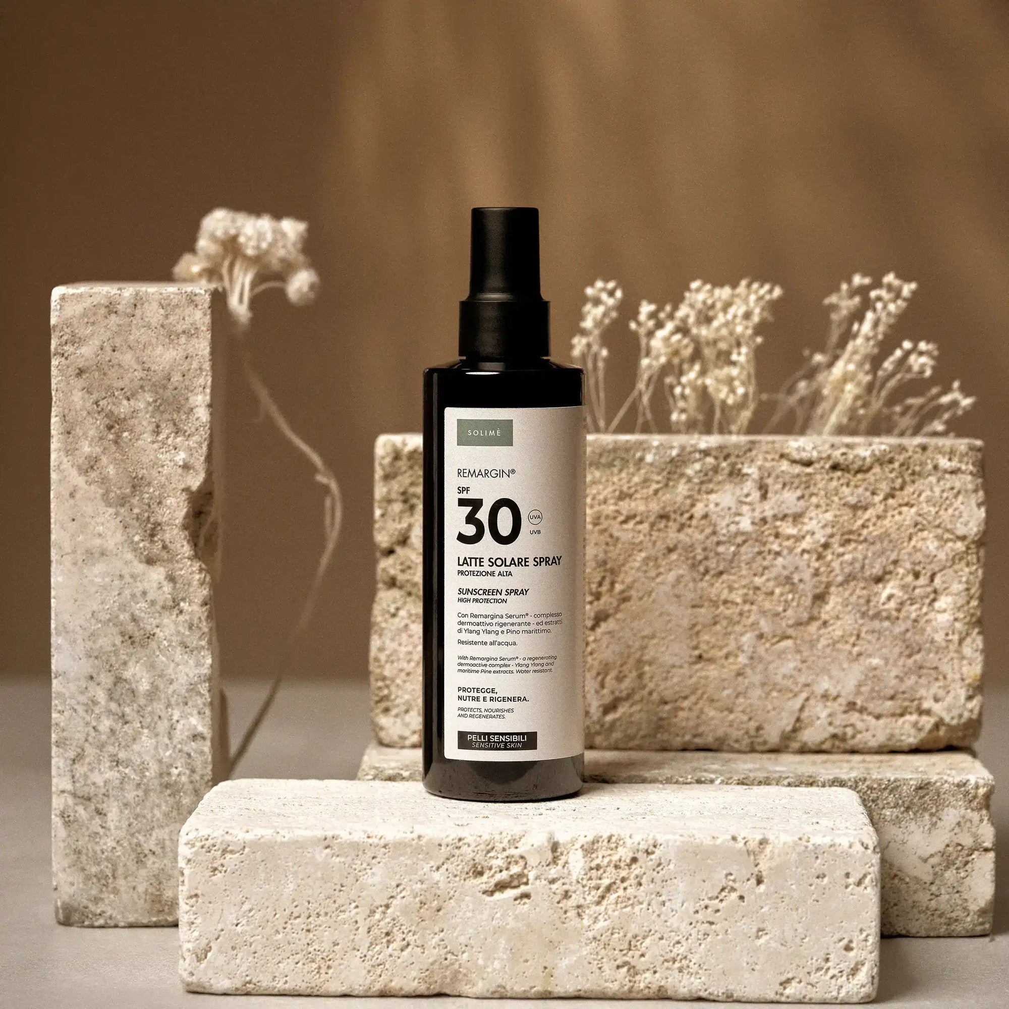 Remargin solari - latte solare spray SPF 30 resistente all'acqua con Colostro, estratti di Ylang Ylang e Pino Marittimo